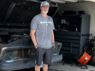 DIY driver working in a home garage